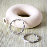 PENDIENTES ARO PLATEADOS TRENZADOS