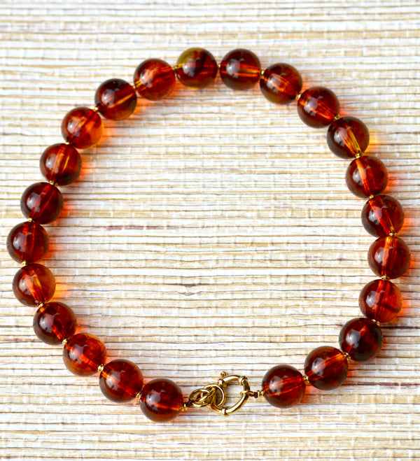 COLLAR BOLAS ÁMBAR MIEL